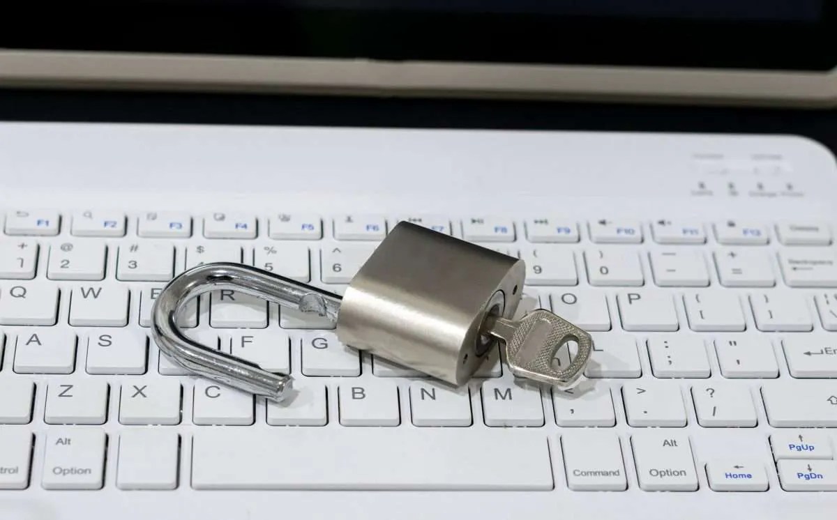 Unlock Website Accessibility with WCAG, image of unlocked padlock on a keyboard